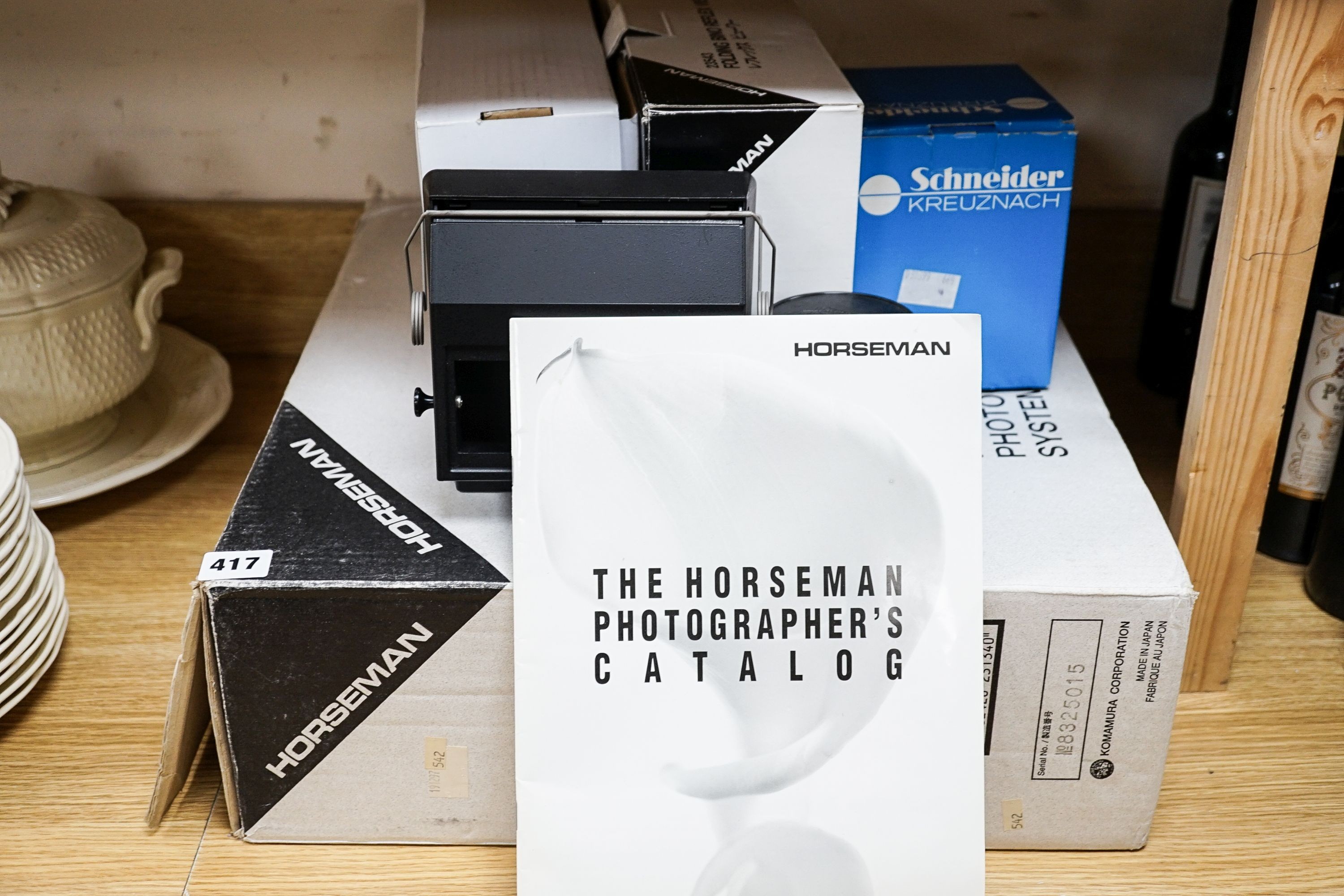 A Horseman L-Series monorail camera with Bino Reflex viewer and a Schneider Kreuznach Apo-Symmar 5.6/210 lens, original boxes